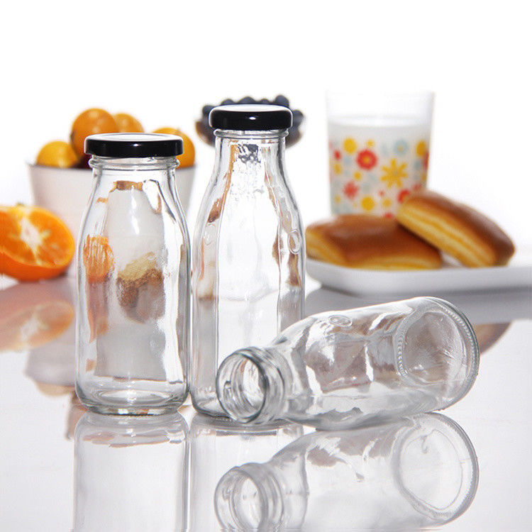 Prezzo di fabbrica 200ml 250ml 350ml 500ml 1000ml Bottiglia di salsa di vetro con coperchio di plastica con coperchio a vite