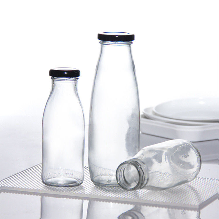 OEM 250ml 500ml 1000ml 2 litri bottiglie di latte di vetro Bottine di latte di tipo alimentare Forma rotonda