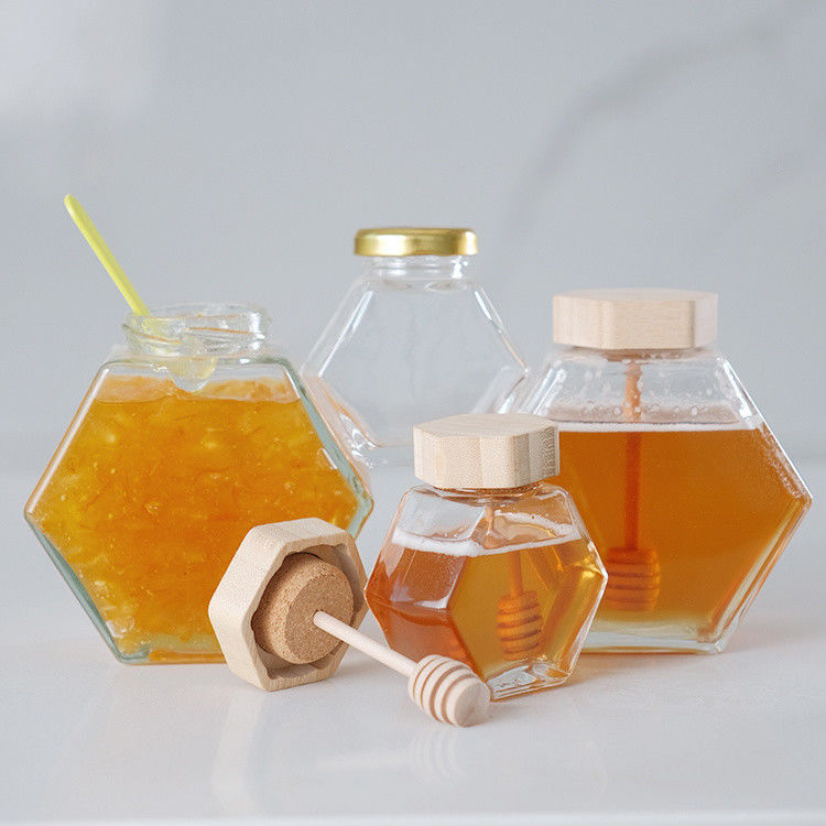 Hexagon Spessore di alimenti trasparenti in diverse dimensioni Bottine di miele di vetro con coperchi di metallo sigillati