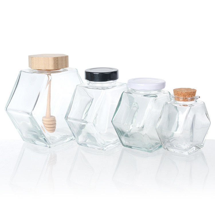 Forma esagonale Vaso da cucina in vetro trasparente con coperchio in acciaio inox o coperchio trasparente