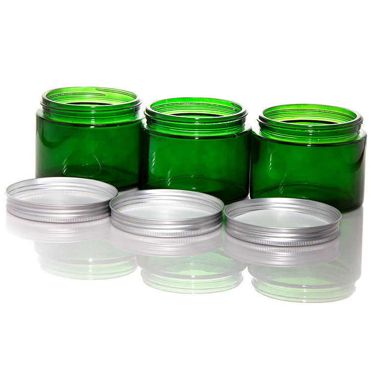 Vaso di candele di vetro trasparente di colore verde vuoto con coperchio