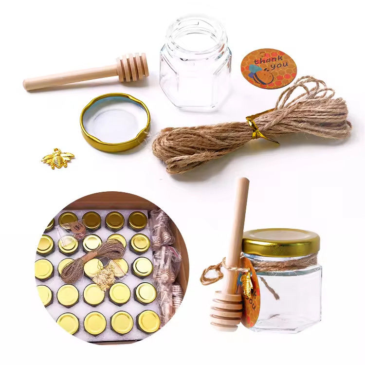 Etichetta personalizzata Forma esagonale 100ml 180ml 380ml Vaso in vetro di miele per marmellata di frutta d'oliva