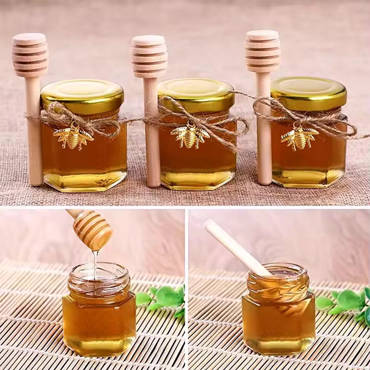 Etichetta personalizzata Forma esagonale 100ml 180ml 380ml Vaso in vetro di miele per marmellata di frutta d'oliva