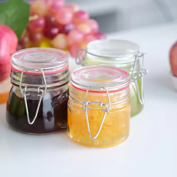 Popolare all'ingrosso 100ml 180ml 280ml Food Grade Round Honey Glass Jar With Clip Cover