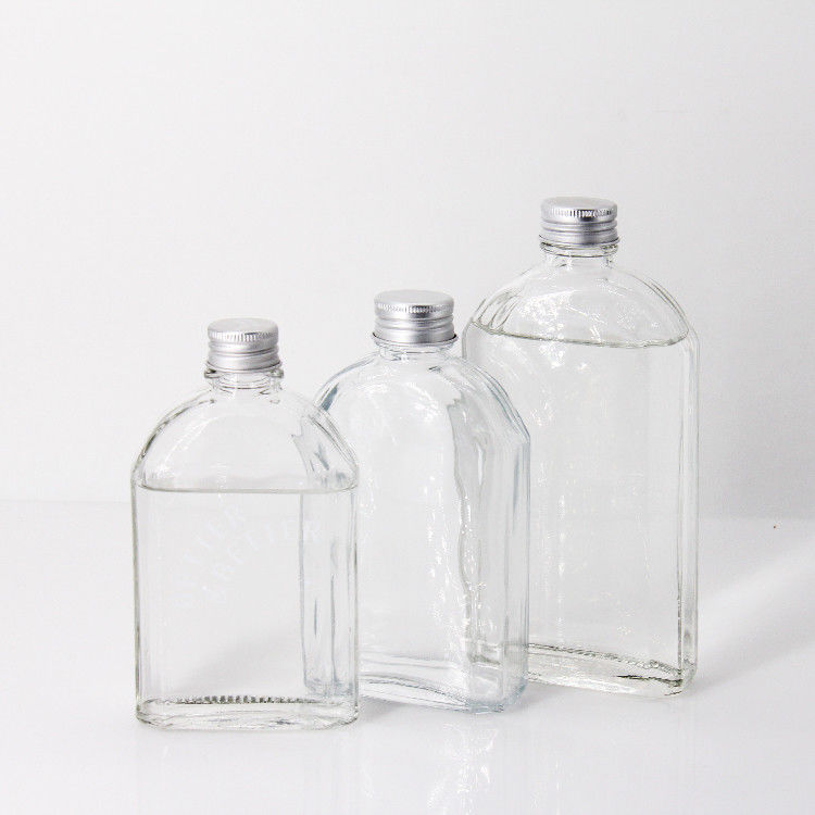 Nuovo design 200 ml 250 ml 300 ml bottiglia di vetro trasparente piatta con coperchio a vite