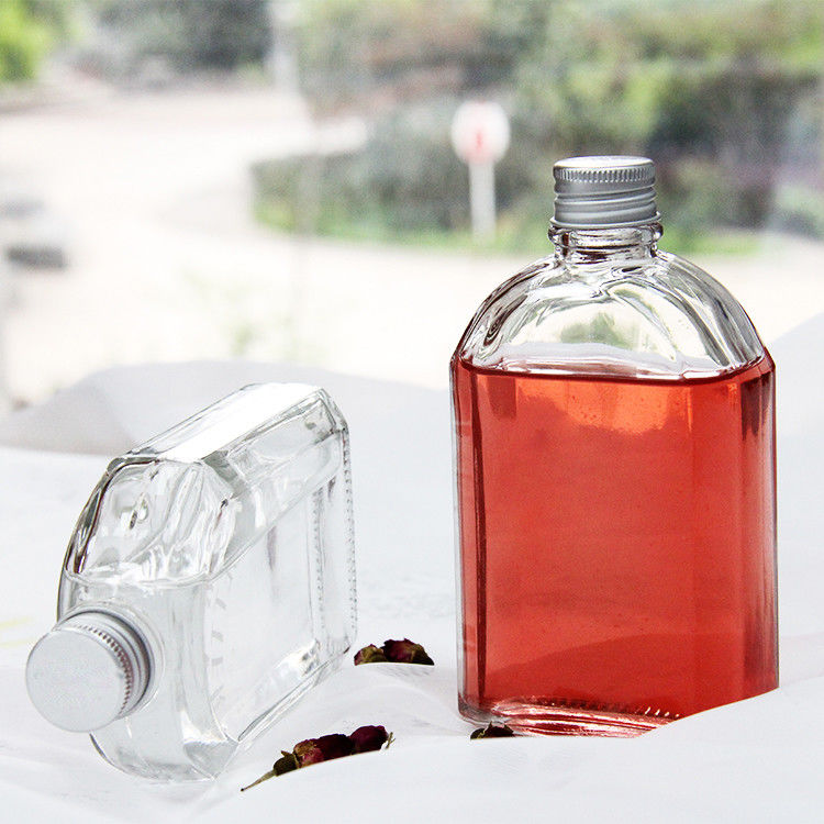 Nuovo design 200 ml 250 ml 300 ml bottiglia di vetro trasparente piatta con coperchio a vite