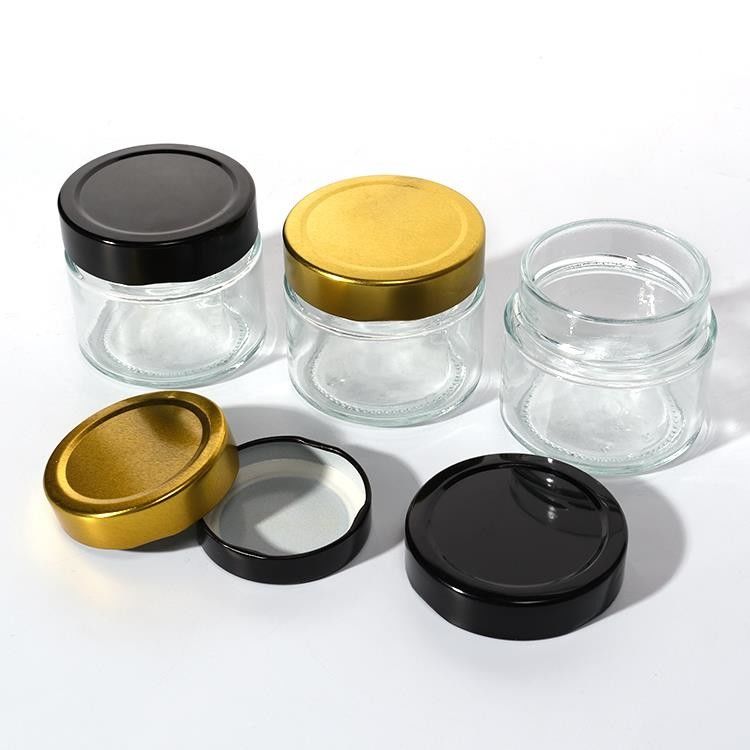 Utilizzare in fabbrica di alimenti 1 oz 4 oz 8 oz di forma rotonda contenitore di stoccaggio vuoto trasparente vetro gelatina marmellata vaso di salsa di miele