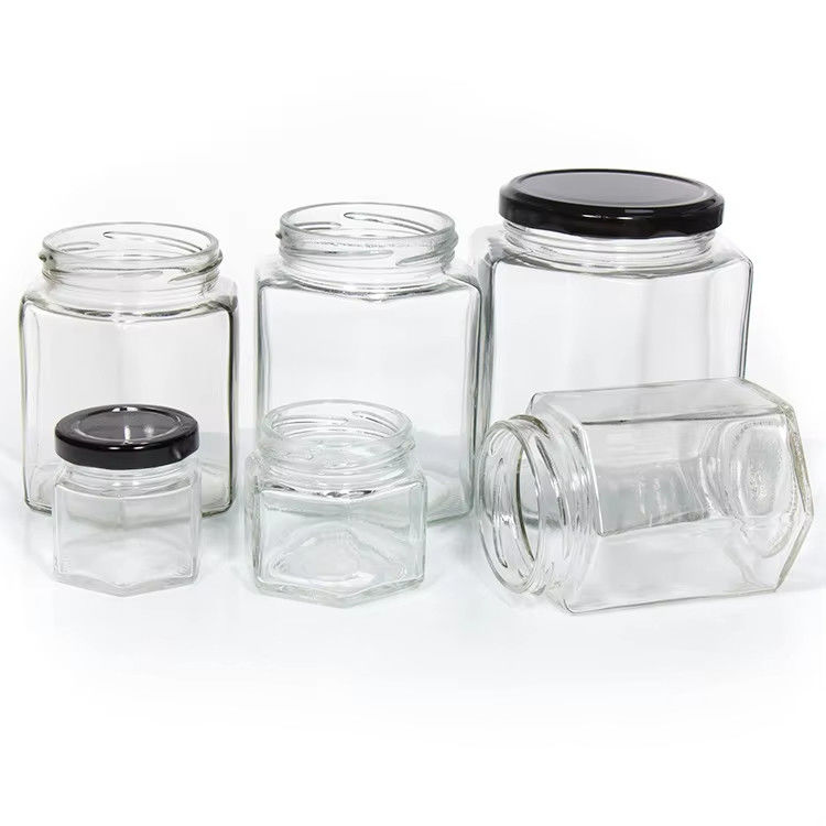 Bottine di miele di alta qualità 2 oz 3 oz trasparenti rotonde trasparenti di vetro per miele con coperchi colorati