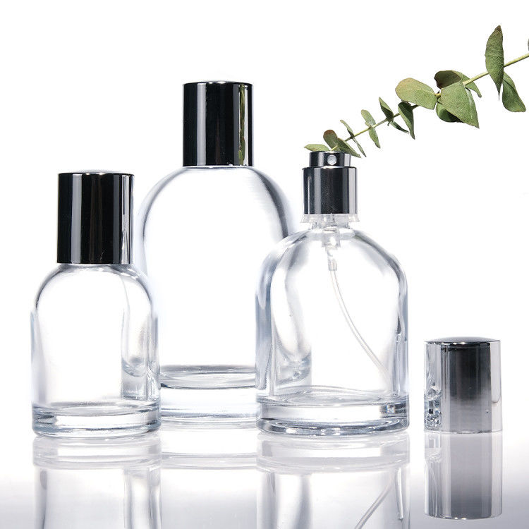 Flasche di profumo di vetro rotondo di lusso da 30 ml 50 ml 100 ml con pareti spesse quadrate con tappi di legno e scatole di design personalizzato