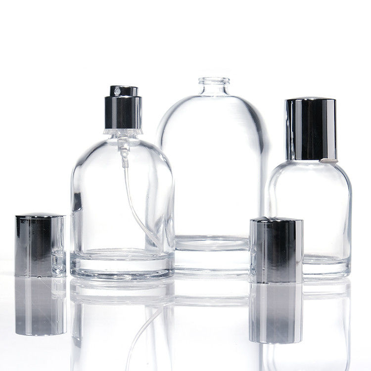 Flasche di profumo di vetro rotondo di lusso da 30 ml 50 ml 100 ml con pareti spesse quadrate con tappi di legno e scatole di design personalizzato
