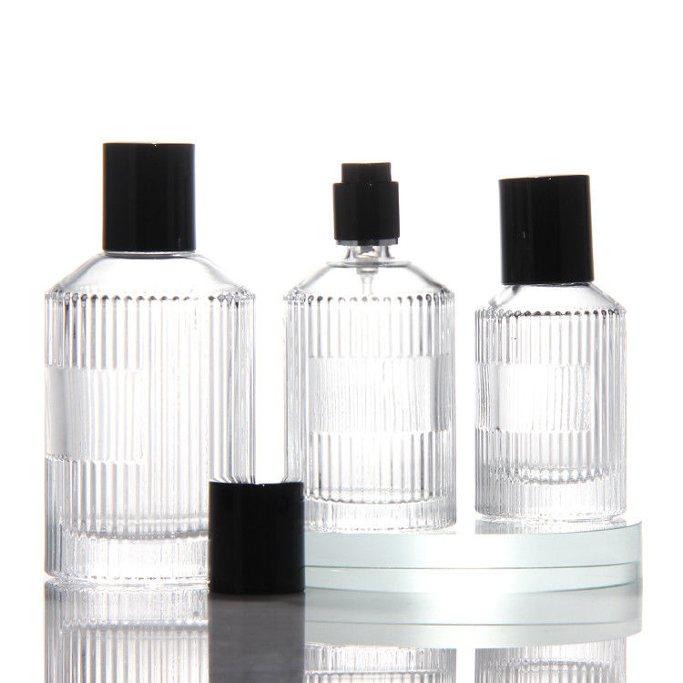 Bottiglia di profumo trasparente cilindrica OEM Bottiglia di profumo in vetro da 50 ml con pompa di spruzzatore per scatole regalo