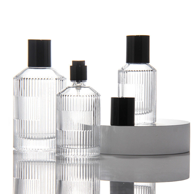 Bottiglia di profumo trasparente cilindrica OEM Bottiglia di profumo in vetro da 50 ml con pompa di spruzzatore per scatole regalo